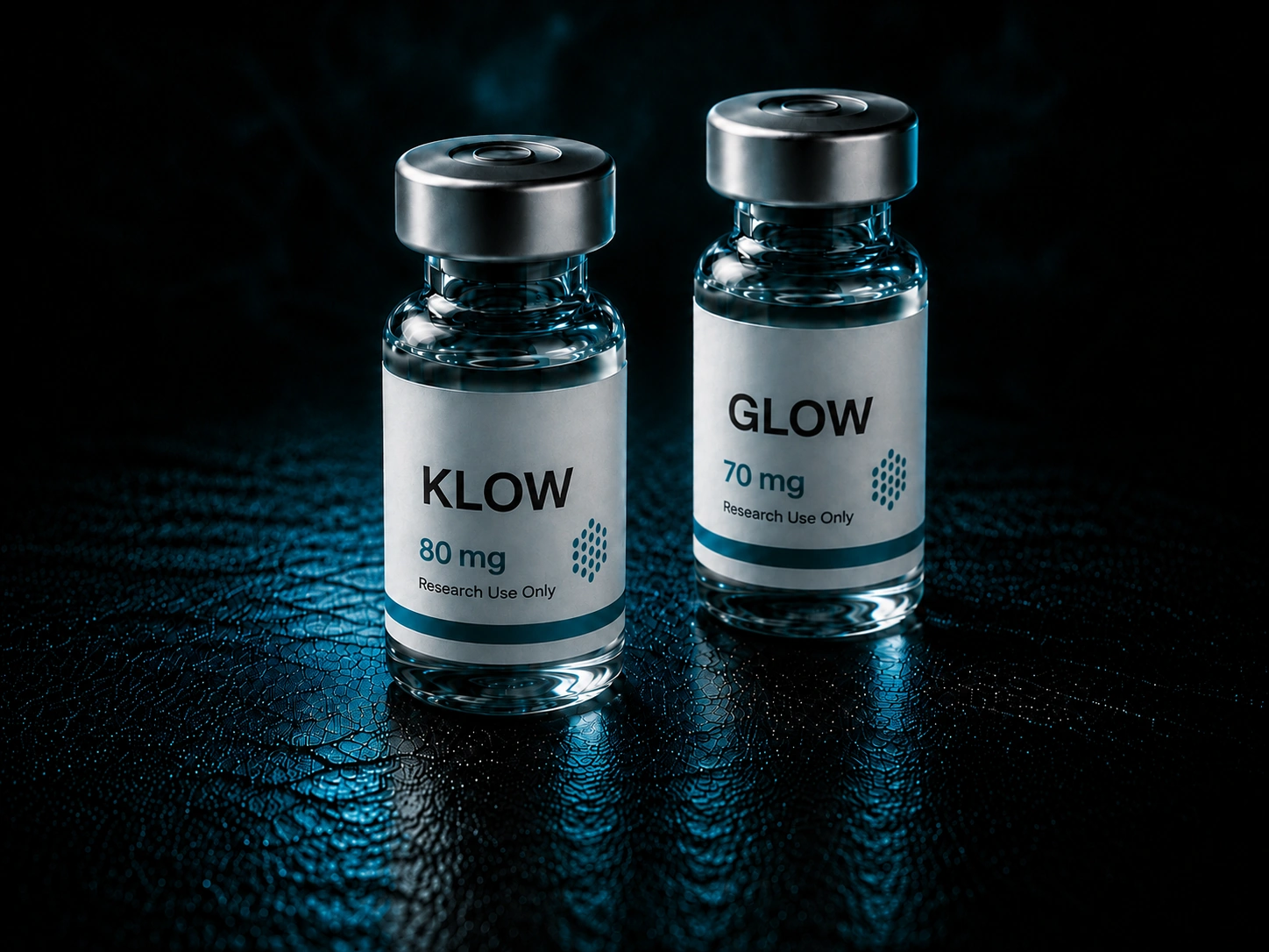 GLOW and KLOW peptide blend vials side by side on a dark surface