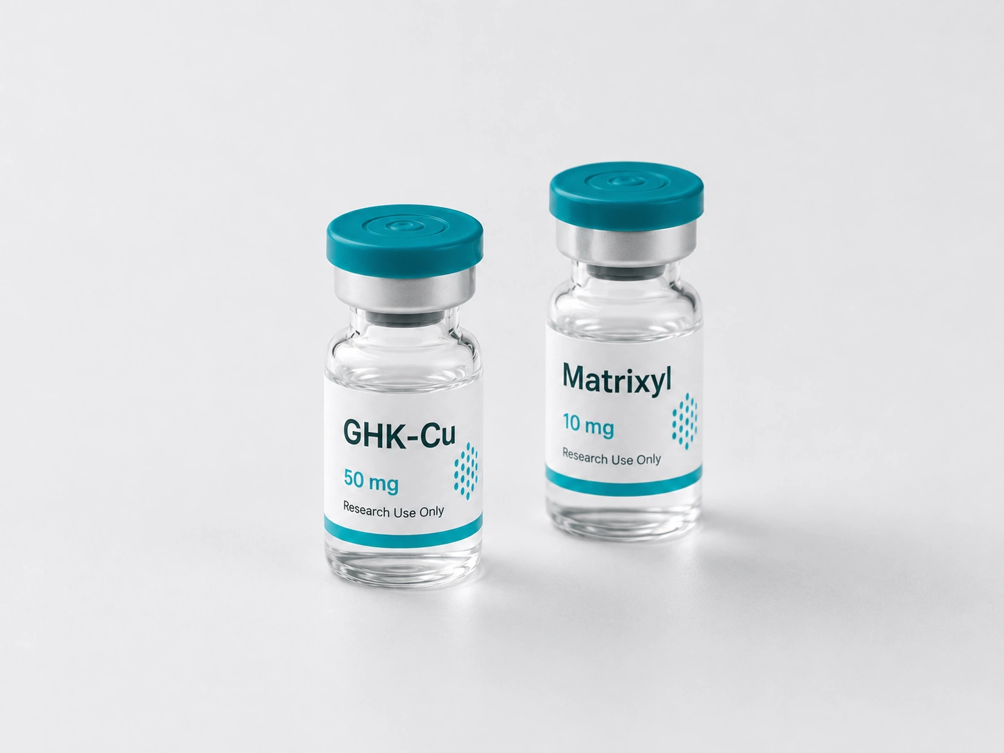 Two research vials labeled GHK-Cu 50 mg and Matrixyl 10 mg side by side on a light surface
