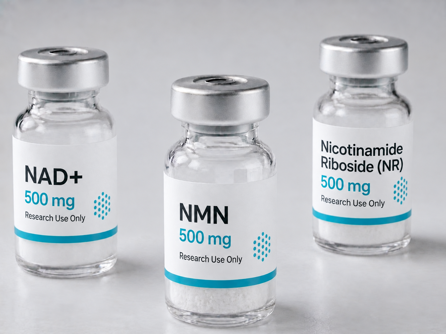 NAD+, NMN and nicotinamide riboside vials on a light studio background
