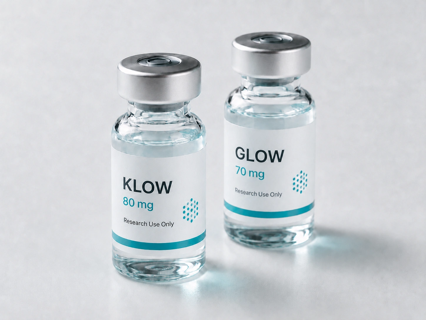 GLOW and KLOW vials side by side on a white surface